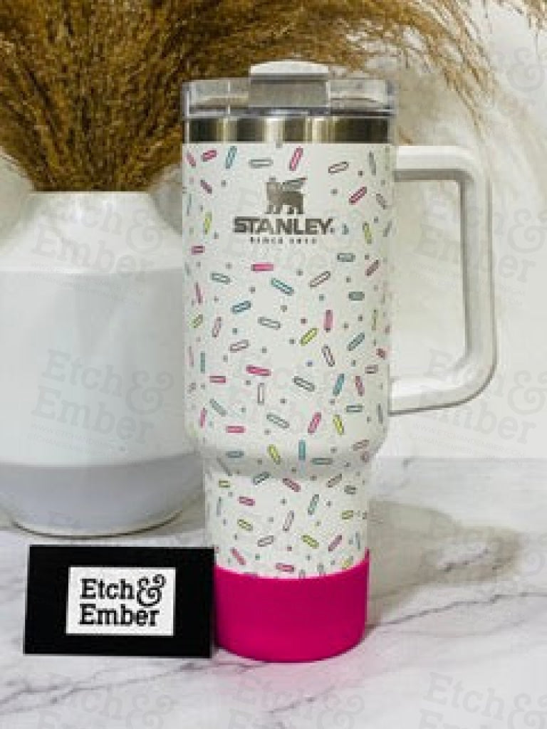 http://etchandember.com/cdn/shop/files/sprinkles-custom-with-surprise-coordinating-boot-engraved-stanley-adventure-quencher-40oz-tumbler-tumblers-756.jpg?v=1684998044