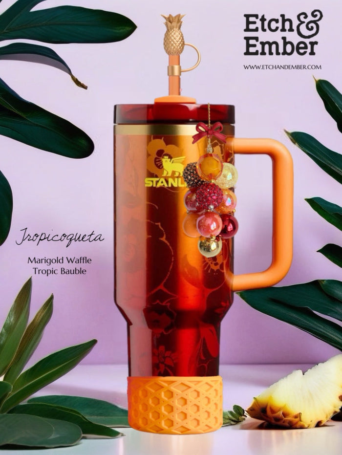Karol G Stanley tumbler styled with bow straw topper and accessories