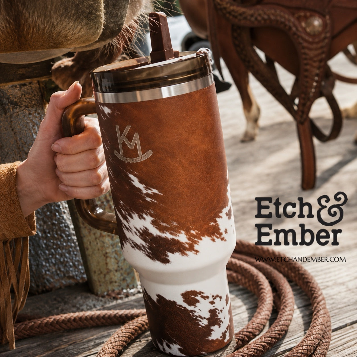 Western-inspired Kacey Musgraves Stanley accessories with cow print tumbler styling