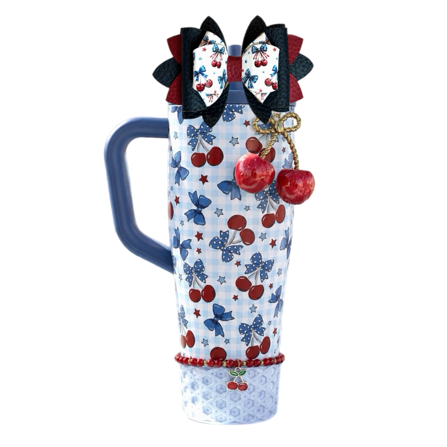 Ice Shaker USA Cherries blue gingham tumbler styled with matching silicone boot, bow, charm, bracelet and cherry straw topper accessories.