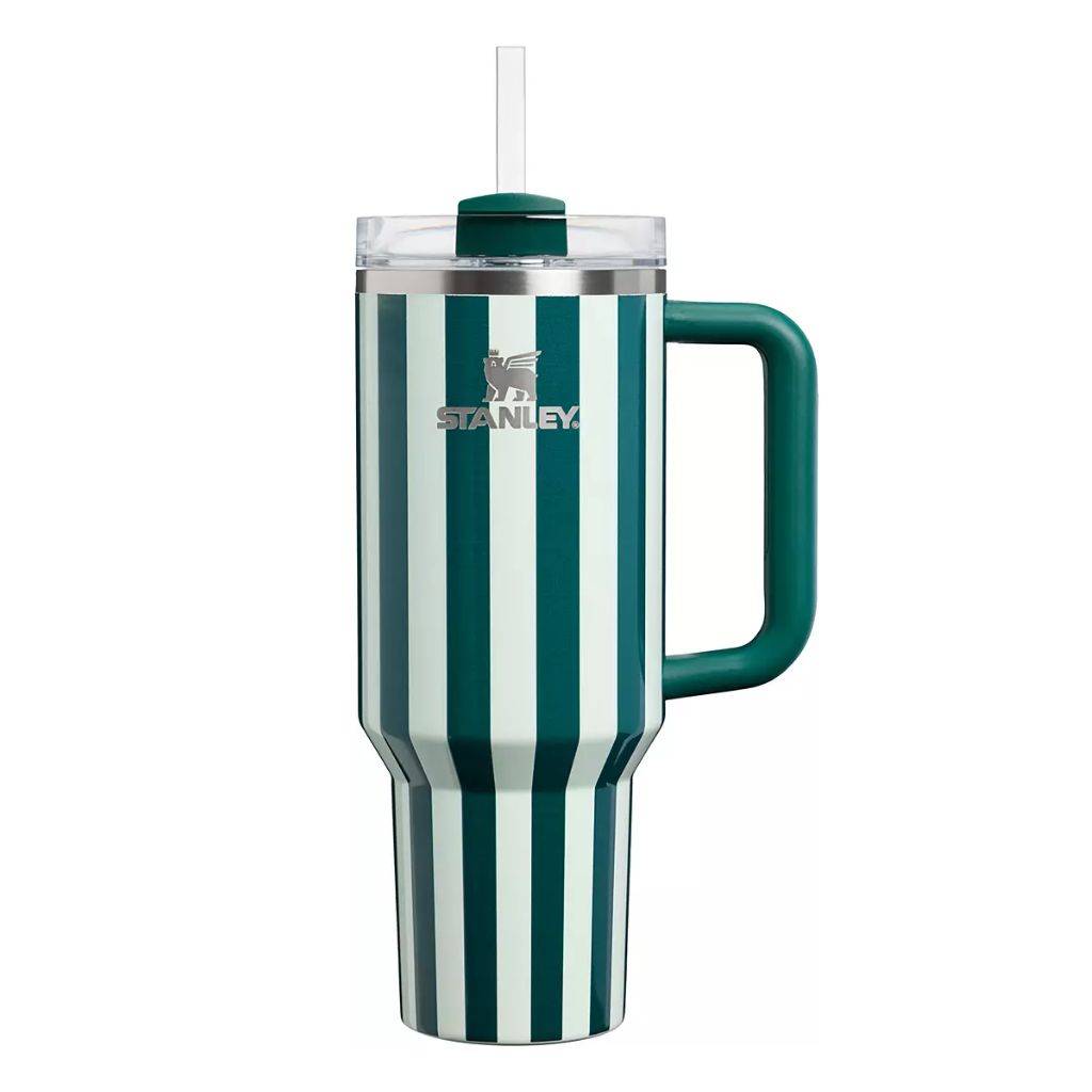 Stanley Wintergreen Peppermint Stripe tumbler with alternating deep green and pale mint-white vertical stripes, dark green handle, matching straw topper, clear lid, and silver Stanley logo.
