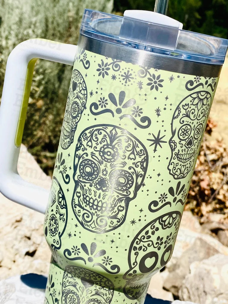 https://etchandember.com/cdn/shop/files/sugar-skulls-stanley-adventure-quencher-40-oz-tumbler-tumblers-625.webp?v=1690572259&width=1445