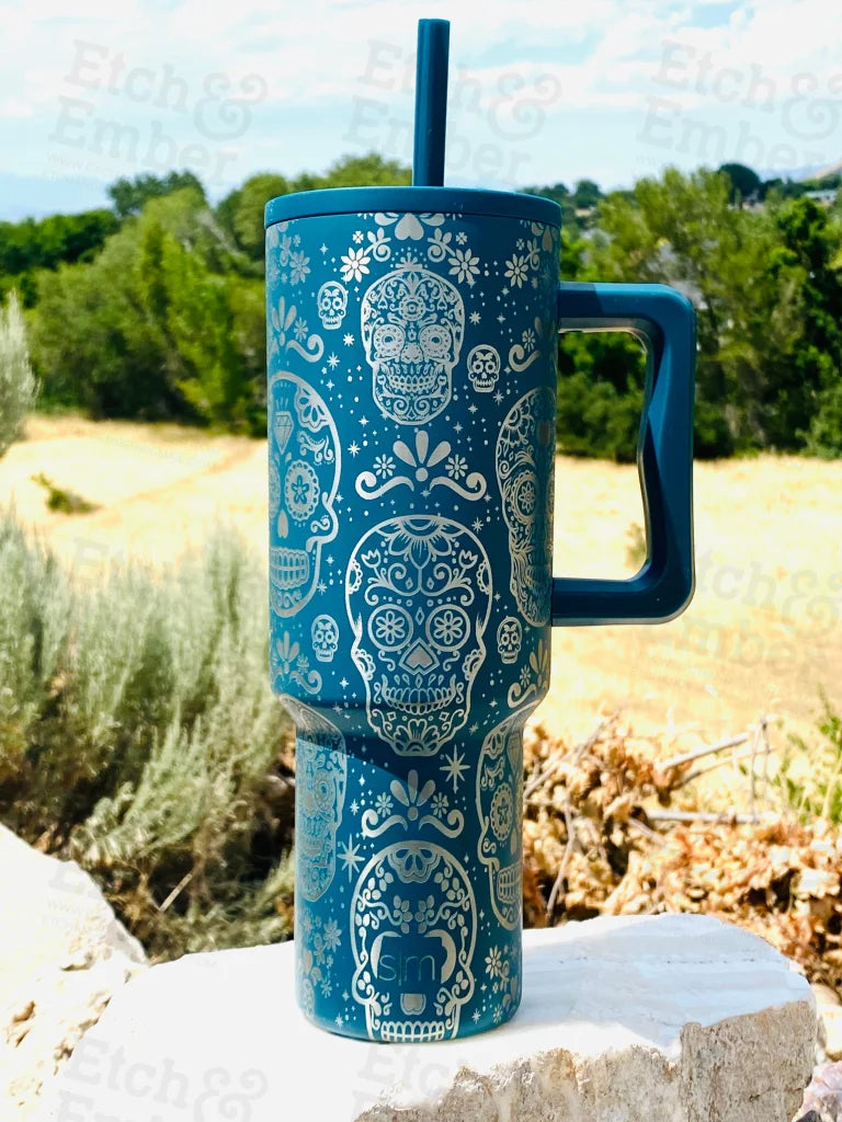 https://etchandember.com/cdn/shop/files/sugar-skulls-trek-tumbler-adventure-quencher-40-oz-tumblers-718.webp?v=1690491267&width=1445